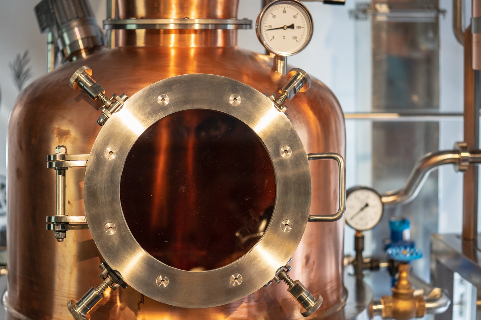 A copper still at a craft distillery